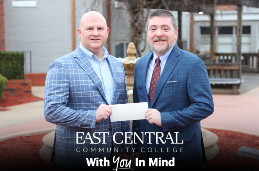 East Central Community College President Dr. Brent Gregory recently accepted a Deeply Rooted, Future Focused capital campaign contribution from Chris Phillips, the District General Manager for Mississippi Power, in a partnership to promote science, technology, engineering, and mathematics at the community college level.